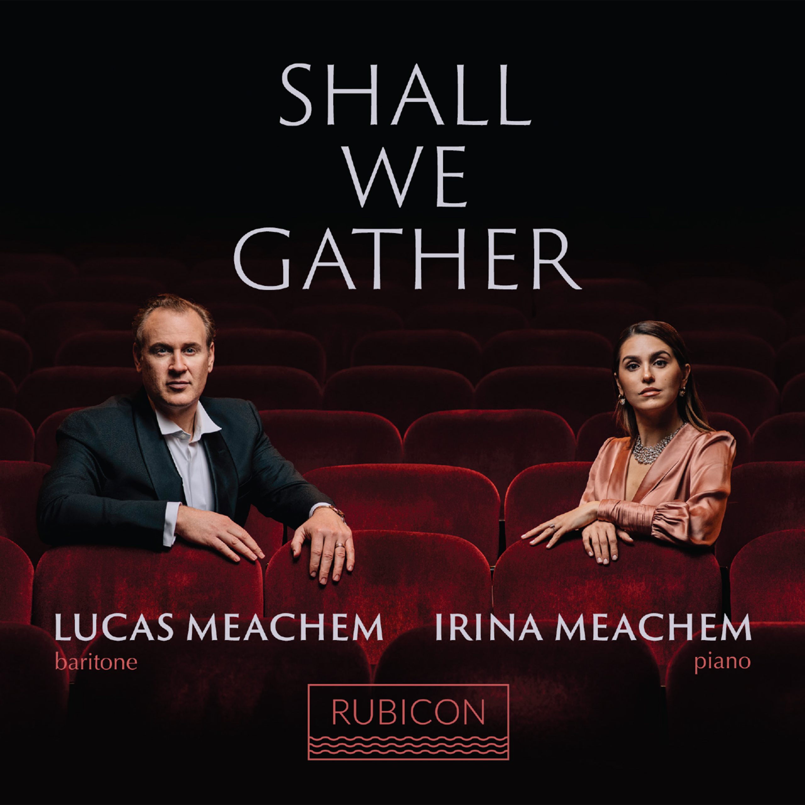 Shall We Gather, solo album by Lucas Meachem, showing Lucas and Irina Meachem sitting in a dark theatre.